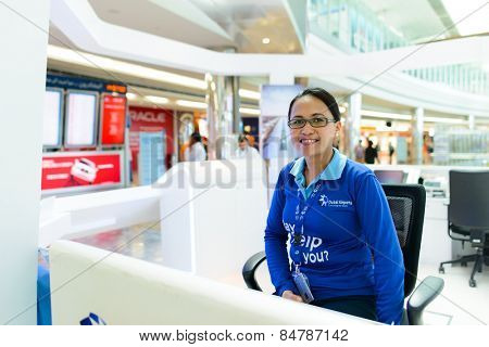 DUBAI, UAE - APRIL 18, 2014: airport help desk. Dubai International Airport is an international airport serving Dubai. It is a major airline hub in the Middle East, and is the main airport of Dubai.