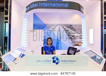 DUBAI, UAE - APRIL 18, 2014: airport help desk. Dubai International Airport is an international airport serving Dubai. It is a major airline hub in the Middle East, and is the main airport of Dubai.