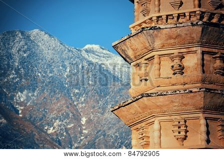 Dali Old Town with pagoda and snow capped Cangshan in Yunnan, China.