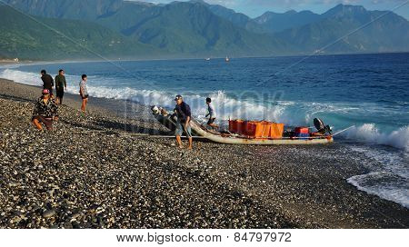 Fishermen Unload The Fishes From The Boat By Using Truck In Hualien Taiwan