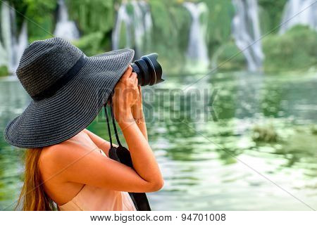 Woman tourist near Kravica waterfall