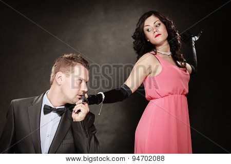 Man In Suit And Woman In Evening Dress.