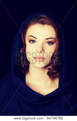 Young beautiful woman wearing headkerchief