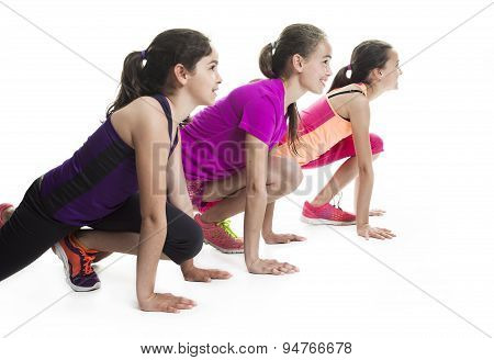running young girl in sport cothes, white background