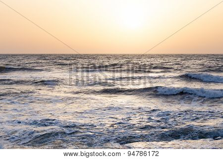 Sunset sunrise on the sea with beautiful waves