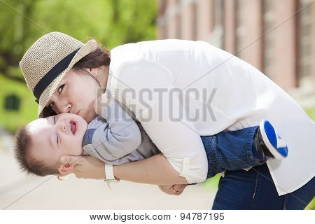 Young mother with her baby boy