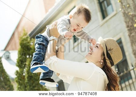 Young mother with her baby boy