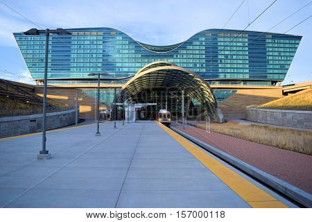 November 16, 2016 in Denver, CO:  RTD Train ready to depart the Denver Airport Station to Union Station in Downtown Denver where locals and tourists can commute by rail from the airport to Downtown Denver and beyond