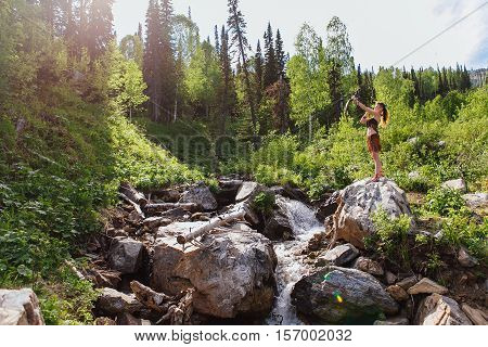 Young Beautiful Amazon Girl Hunting In The Forest