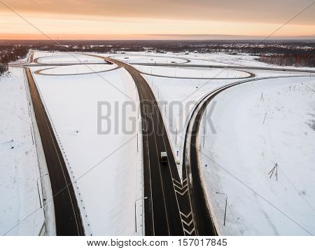 winter road junction in the countryside aerial view  in the form of butterfly