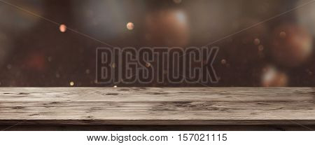 Panorama for a festive occasion in front of an empty wooden table for a concept