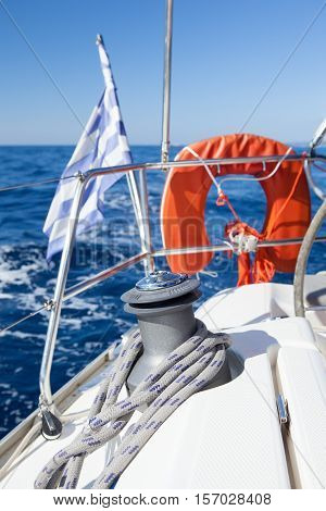 Winch with blue rope on a yacht
