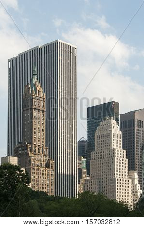 Vertical Manhattan skyline with skyscrapers and blue sky