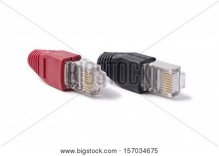 ethernet connectors RJ45 6 category with red and black caps on a white background