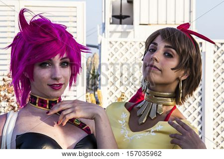 QUARTU S.E., ITALY - August 2, 2015: Beach Cosplay Party - costume parade held at the Marlin Club of Poetto Beach - Sardinia - portrait of pretty girls in cosplay costume