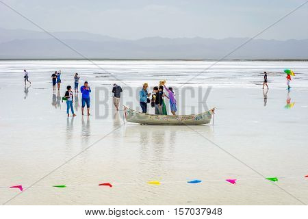 People Taking Photos At Chaqia Salt Lake, Qinghai, China