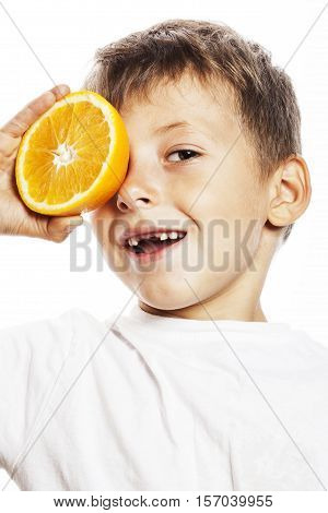 little cute boy with orange fruit double isolated on white smiling without front teeth adorable kid cheerful close up
