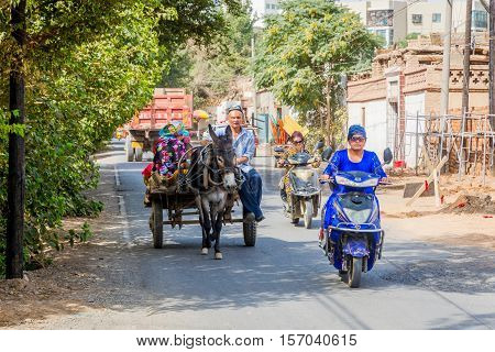 Donkey Carriage And Motorbikes, Turpan, China