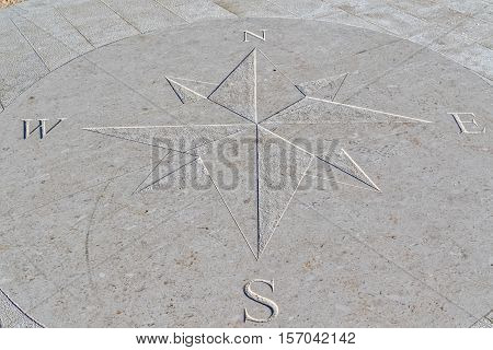 Compass engraved on the stone pier, Tucepi town.