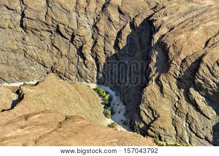 Beautiful landscape of the Kuiseb canyon in Namib desert at sunset. Flying in a small plane over the desert is one of the most popular tourist attractions in Namibia