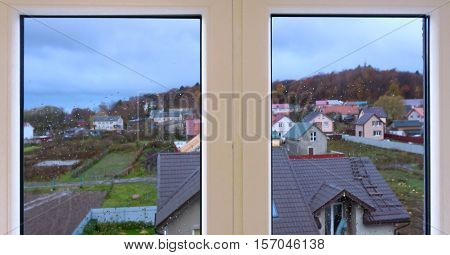 the view from the window picturesque village houses with colorful roofs
