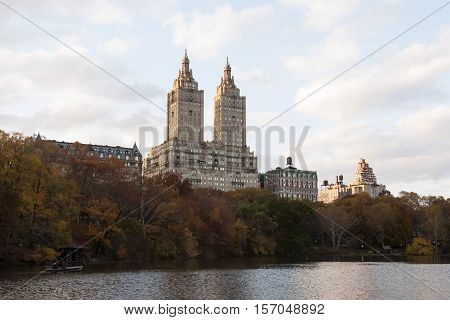 Autumn Colored Trees With Buildings Behind Them