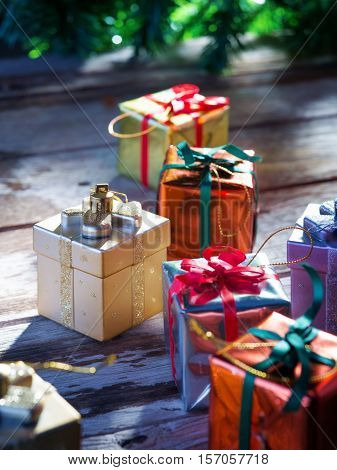 close up view of christmas  gift boxes  on wooden back