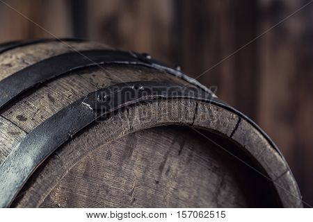 Wooden barel. Old wooden keg. Barel on beer vine whiskey brandy or cognac.