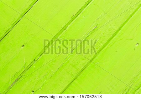 Green Wooden Background With Purple Spot