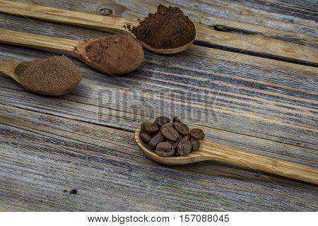 Beautiful Little Wooden Spoon With Coffee On  Background