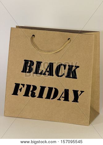 Black friday brown recycle shopping bag with handles on white