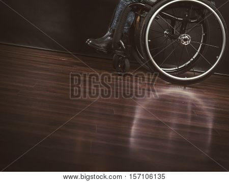 Disease disability paralysis handicap health concept. Legs of disabled person. Crippled female sitting on wheelchair.