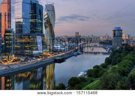MOSCOW - JUN 24, 2015: Moscow International Business Center and Bagration bridge at night. Investments in Moscow International Business Center was approximately 12 billion dollars 