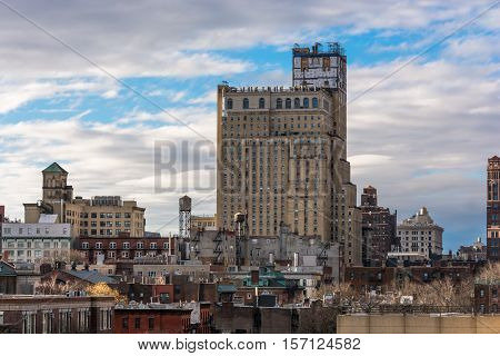Brooklyn New York partial skyline rofftops and water towers