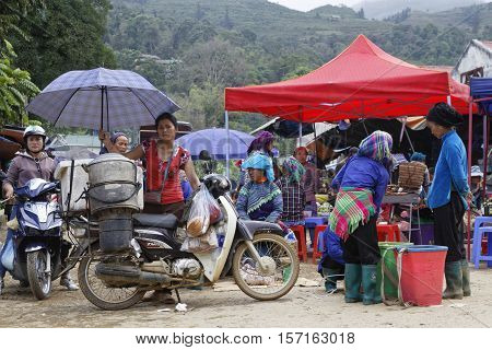 Sin Cheng, Vietnam, October 26, 2016 : Women On The Market. Hmong Women Of North Vietnam Wear Their