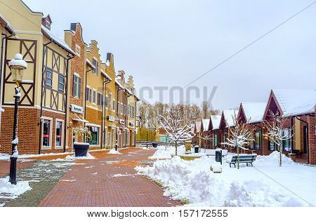 KIEV UKRAINE - NOVEMBER 11 2016: The Dutch style shopping neighborhood offers large amount of fashion stores cafes and bars for visitors on November 11 in Kiev.