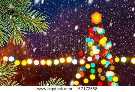 Christmas tree with unfocused bauble in the night