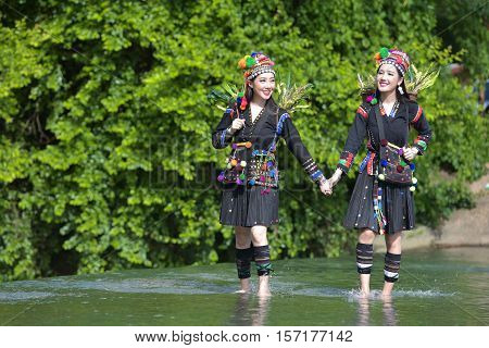 Hmong hill tribe people dressed in costumes a beautiful city in Laos.