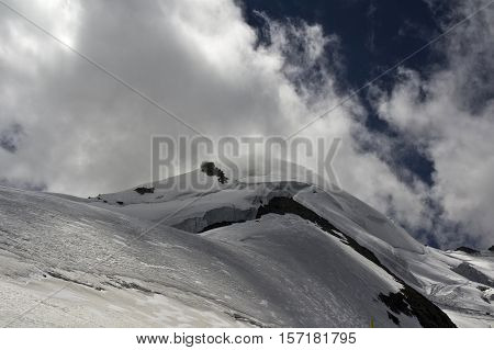 view of allalinhorn in swiss alps during summer