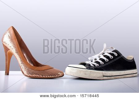 Fashion And Sport Shoes On Abstract Grey Backround