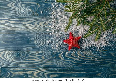 Christmas Border. Tree Branches With Stars Snow On Wooden Board