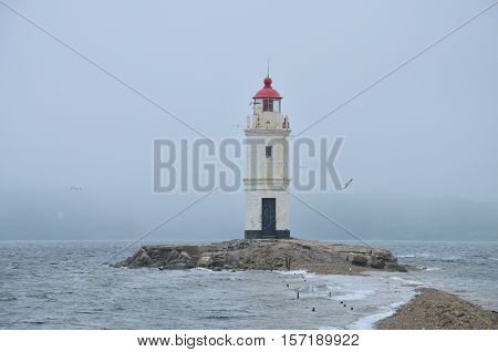 Tokarev lighthouse at the Vladivostok in the fog