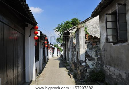 Weathered and old buildings lining the narrow alleyways in Luzhi Town in Jiangsu province China