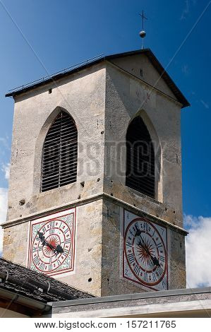 Clock tower of the ancient Benedictine convent of Saint John (UNESCO world heritage site) in Monastery valley Mustair Grisons Switzerland