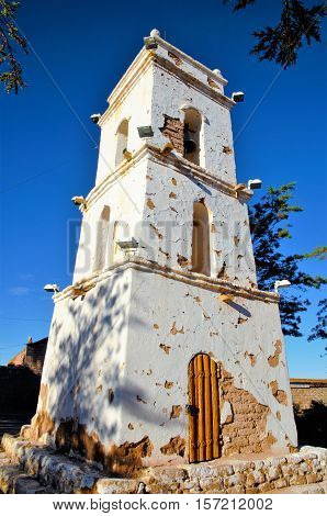 Bell tower and church in the village Toconao close to San Pedro de Atacama in the Atacama desert in Chile South America