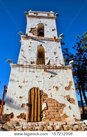 Bell tower and church in the village Toconao close to San Pedro de Atacama in the Atacama desert in Chile South America