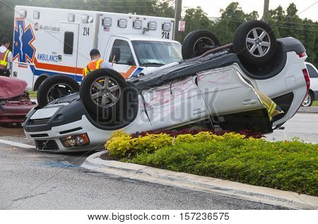 Orlando Florida - September 15th 2009: Vehicle rollover accident at major intersection in Orlando Florida September 15th 2009