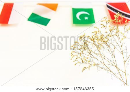 Flowers White And Flag; On The Grey Background