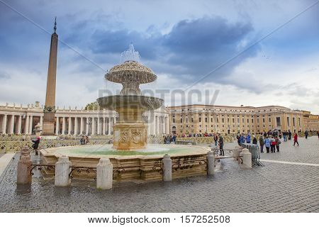 ST.PETER VATICAN ROME ITALY - NOVEMBER 8 : tourist taking a photo in front of stpeter basilica church on november 8 2016 in rome italy