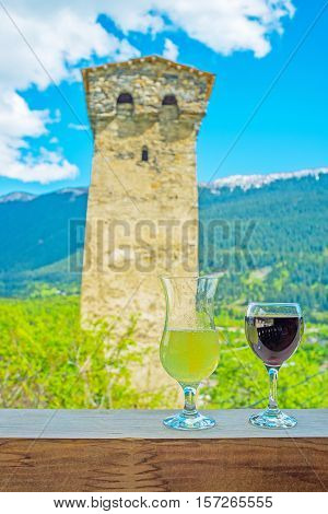 The best way to relax in mountains of Svaneti is to taste local cuisine and enjoy the glass of wine or famous Georgian lemonade Mestia Upper Svaneti Georgia.